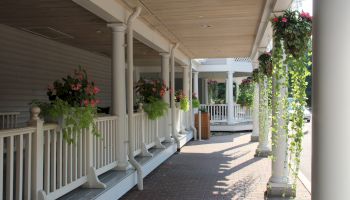 Take in the charm of Two Trees Inn with inviting walkways, classic architecture, and peaceful surroundings.