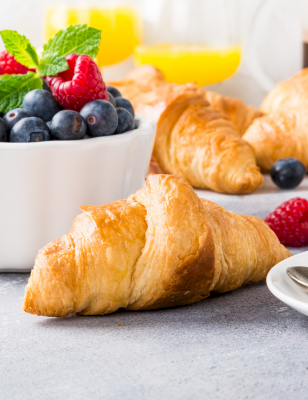 Enjoy a relaxed morning with our complimentary continental breakfast, included with your stay at Two Trees Inn.
